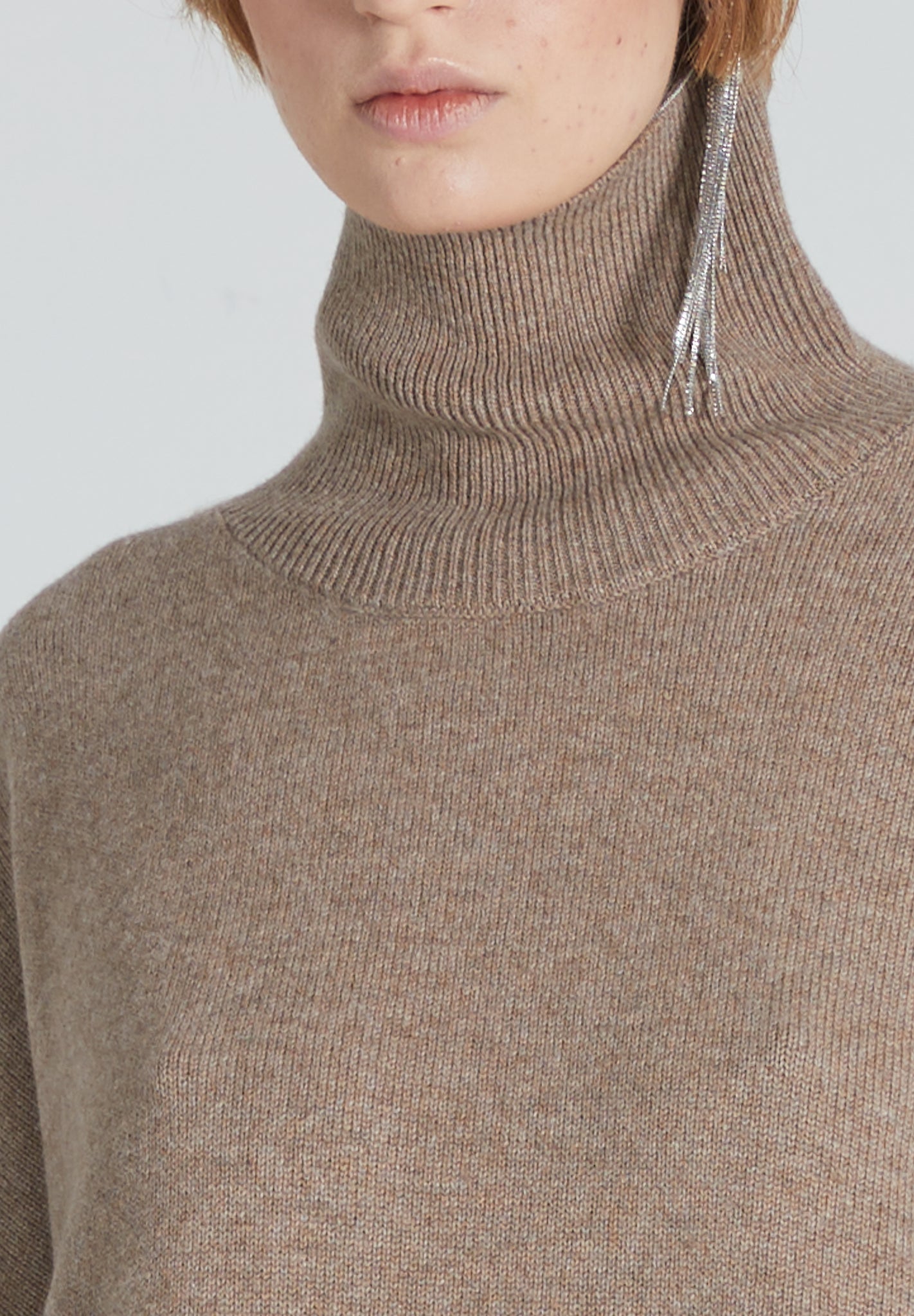 Closeup of brown cashmere turtleneck 